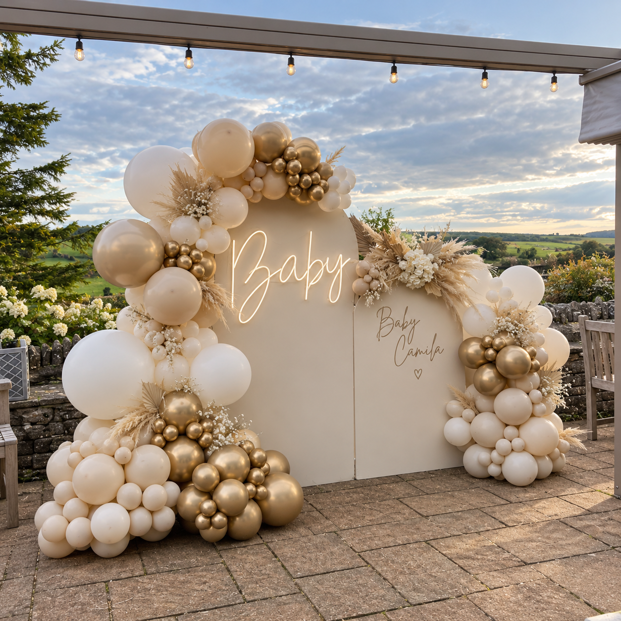 Illustrated neutral baby shower panels with cream and gold balloons and a glowing Baby sign